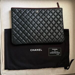 Chanel Quilted Caviar O Case clutch bag